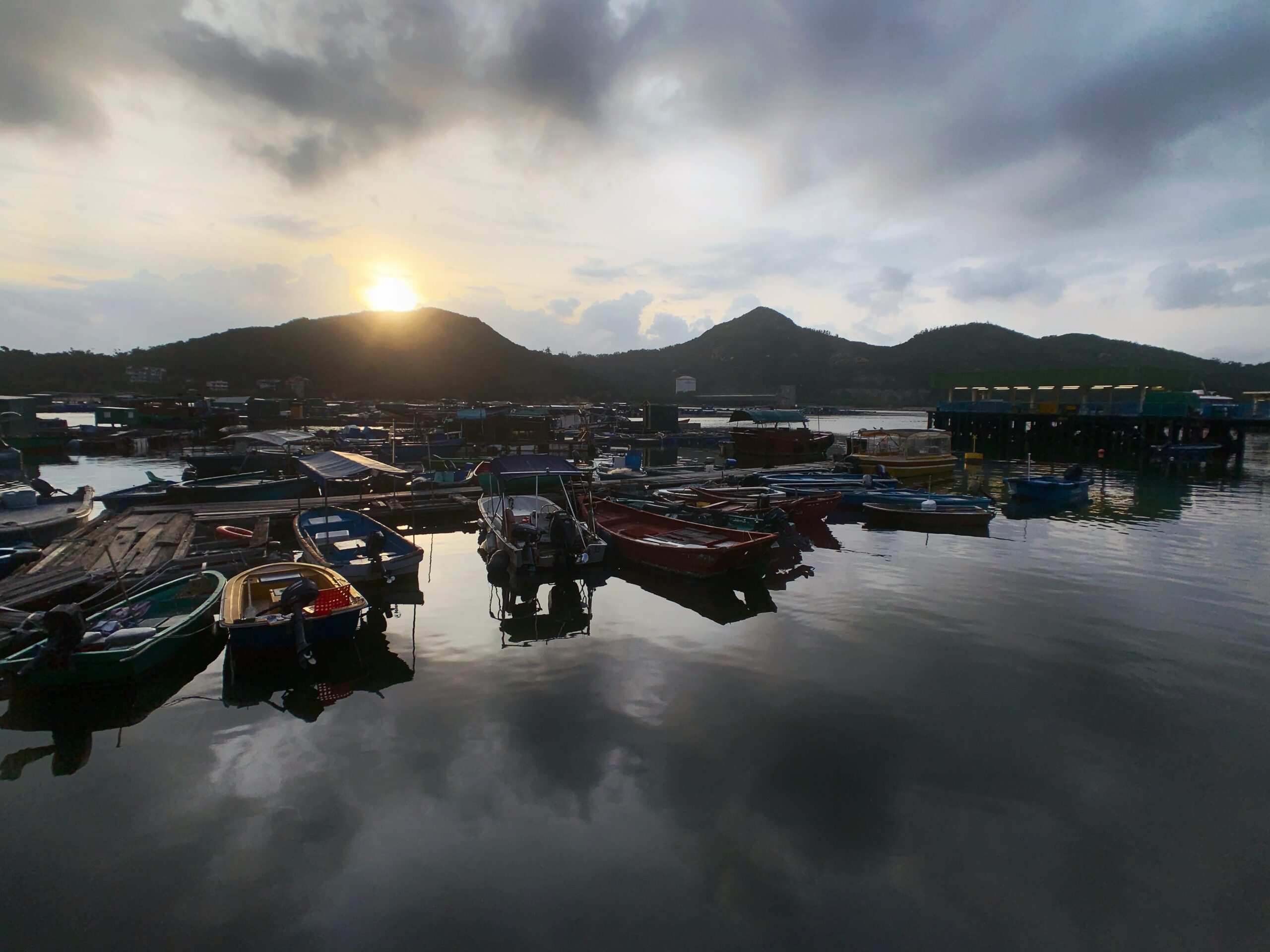 sunrise view over boats in Lamma Island Hong Kong