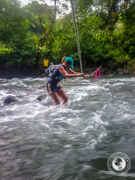 Crossing the river during the Moon Run in Monteverde, Costa Rica